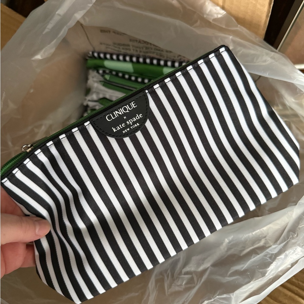Clinique Black and White Striped Cosmetic Bag with Green Zipper